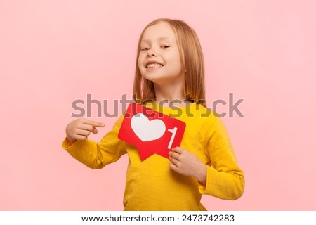 Image, Stock Photo Cute little girl holding hands eco bamboo toothbrush on beige background. Sustainable living concept. Save the Planet for our children