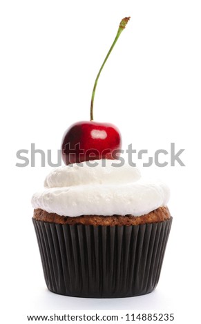 Cupcake with whipped cream and cherry isolated on white - stock photo