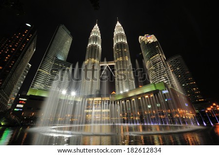 KUALA LUMPUR, MALAYSIA - AUGUST 31: Petronas Twin Towers at night on August 31, 2012 in Kuala Lumpur. Petronas Twin Towers  were the tallest buildings (452 m) in the world from 1998 to 2004.