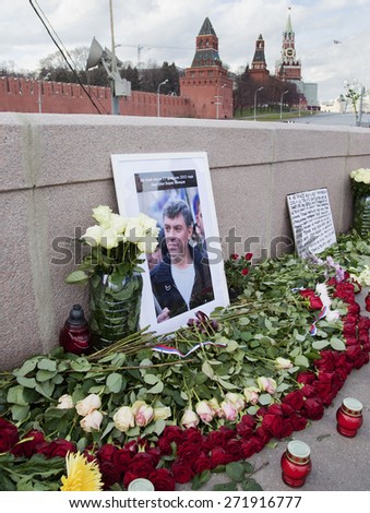MOSCOW, RUSSIA -  APRIL 18 ,2015:  Flowers at the place of murder of the russian opposition leader Boris Nemtsov. Nemtsov was assassinated on 27 Feb 2015 on a bridge near the Kremlin in Moscow.