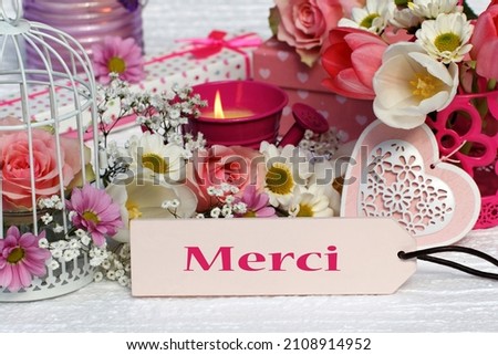 Romantic decoration with the lettering thank you in french.(Romantische Dekoration mit dem Schriftzug Merci) Zdjęcia stock © 