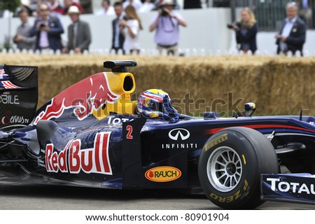 GOODWOOD, UNITED KINGDOM - JULY 1: Formula One drive Mark Webber from Red Bull Racing drives up the hill at the Goodwood Festival of Speed in the United Kingdom on July 1, 2011 in Goodwood, UK