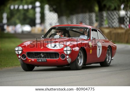 GOODWOOD, UNITED KINGDOM - JULY 3: A classic Ferrari drives up the hill at the Goodwood Festival of Speed in the United Kingdom on July 3rd 2011 in Goodwood, UK