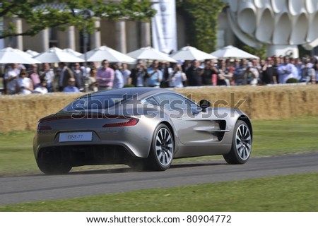 GOODWOOD, UNITED KINGDOM - JULY 3: The stunning Aston Martin One-77 drives up the hill at the Goodwood Festival of Speed in the United Kingdom on July 3rd 2010 in Goodwood, UK
