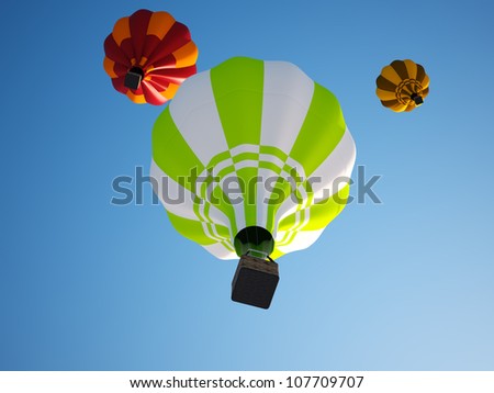 colorful hot air balloons floating in the clear sky