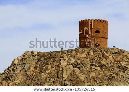Typical Oman Watchtower with cellular and microwave antennas, in Mutrah, Muscat, Oman, Middle East