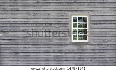 background of the wall of an old house with a window with room for text
