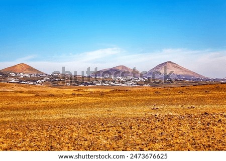 Similar – Image, Stock Photo Landscape in Timanfaya National Park. Lanzarote. Canary Islands. Spain.