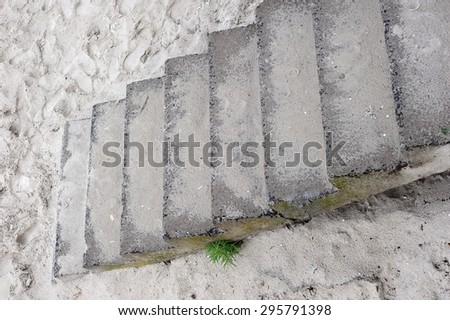 Stairway to Sand; concrete staircase standing on sand