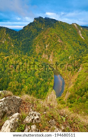 The Dunajec River Gorge in The Pieniny Mountains, Carpathians. The Three Crowns massif visible from The Sokolica Mountain. Candid landscape.
