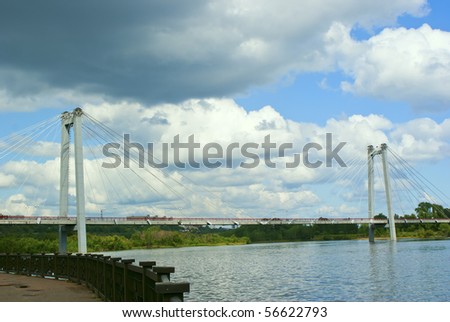 The foot bridge through the river Yenisei