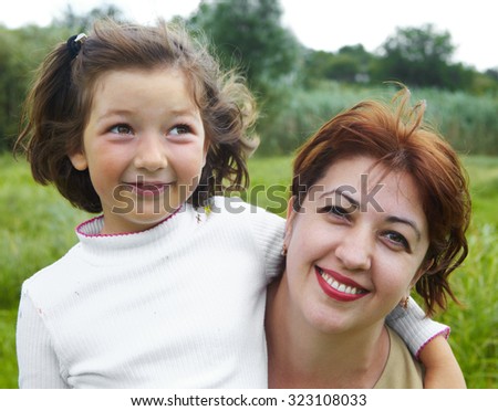 Happy mother and little daughter. Childhood and emotions