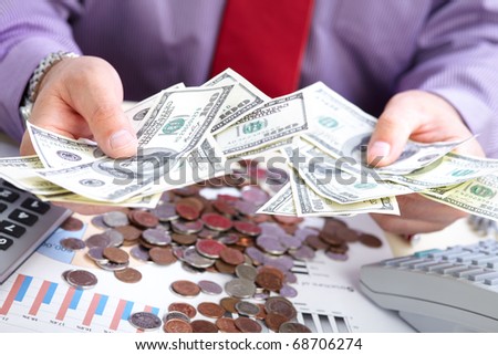 Businessman with cash, money, bills, coins
