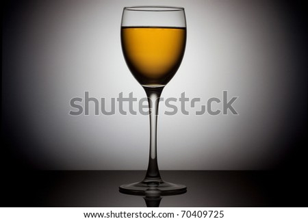 Glass of wine over circle background