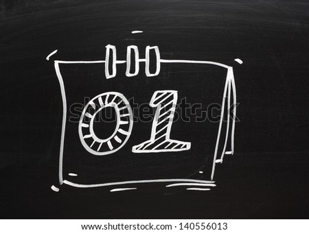 Chalk drawing on a blackboard  of a desktop calendar open at the first day of the month or year