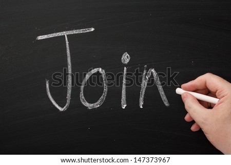 The word Join in hand writing on a used blackboard. We are all of us asked to Join in on a daily basis, be it a community,website,forum, social network or movement