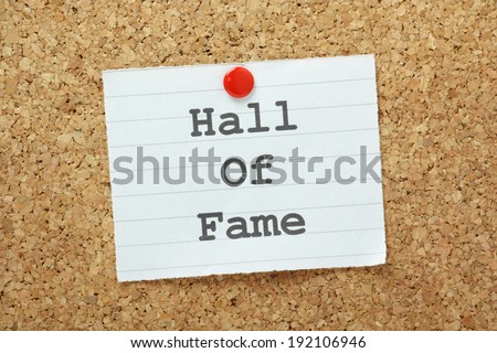 The phrase Hall of Fame typed on a piece of paper and pinned to a cork notice board