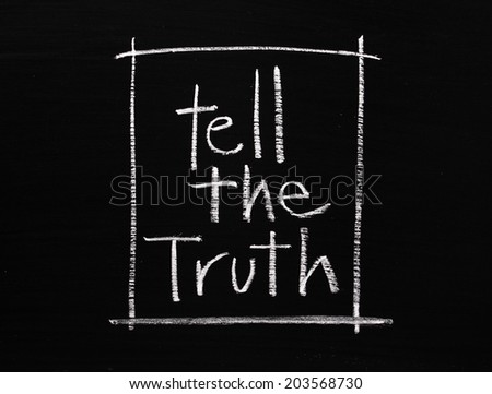 The phrase Tell The Truth written by hand in white chalk on a blackboard surface