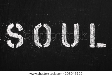 The word SOUL in stencil letters on a blackboard.Soul music emerged in the twentieth century from cities including Detroit and Chicago in the USA