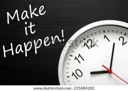The phrase Make It Happen written on a blackboard next to a modern clock to emphasize the deadline