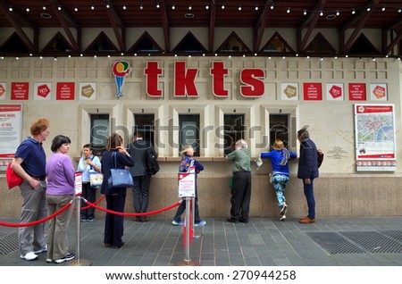 London, England - April 16, 2015: Customers at the TKTS Ticket Office in Leicester Square, London. TKTS sells theater tickets at discounted prices and has operated in Leicester Square since 1980