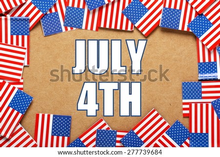 A border of miniature flags of the United States of America around the text July 4th, the date for Independence Day celebrations