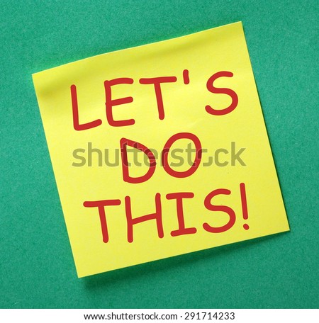 The phrase Let\'s Do This in red text on a yellow sticky note posted on a green notice board