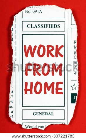 Newspaper clipping from the classified advertising section with the phrase Work From Home in red text. Clipping made in MSword by the photographer