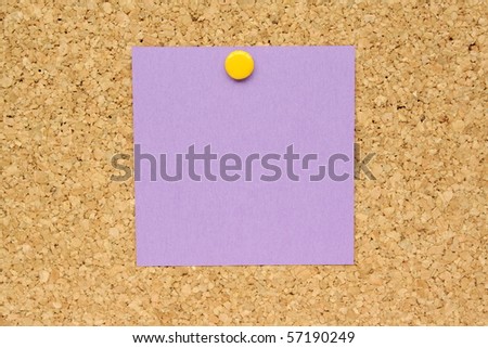 Purple square post it note and yellow pin on a cork board