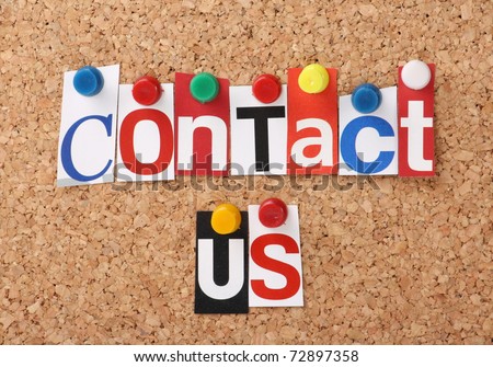 The words Contact Us in cut out magazine letters pinned to a cork notice board
