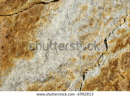 A rectangular piece of earth tone slate.