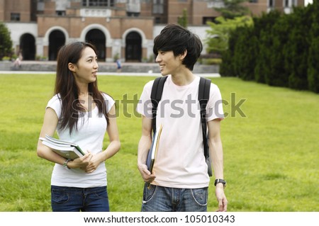 Couple happy college student at a campus