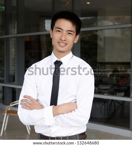 Portrait of Asian graduating student.