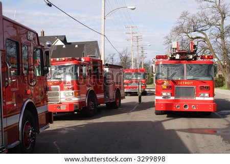 Firetrucks parked on an urban street in Detroit
