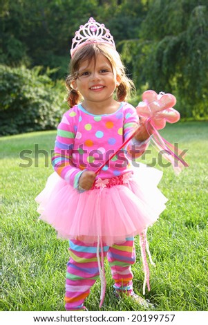 little girl in pink ballet dress up clothes, in a tiara and tu-tu