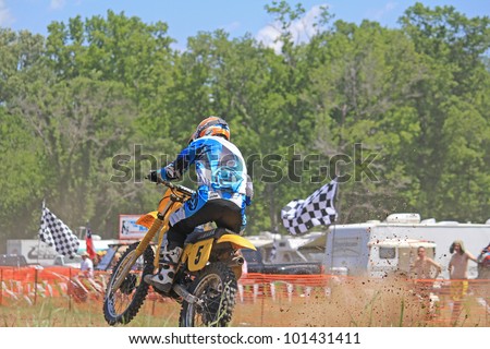 JEFFERSON, TX - APR 22: Legendary motocross and supercross star Guy Cooper won all four motos of Marty Tripes 100cc Works Revenge on April 21-22, 2012 in Jefferson, Texas.
