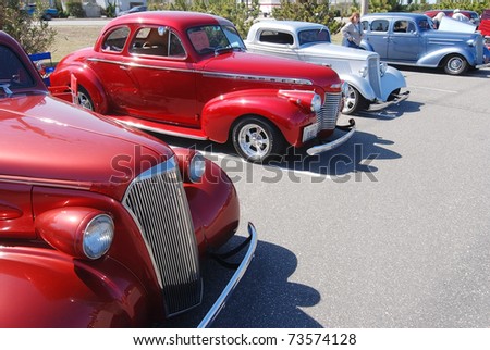 NAGS HEAD, NC - MARCH 19:  Vintage cars on display at Outer Banks Charity Car Show presented by First Flight Cruisers on March 19, 2011 in Nags Head, North Carolina.