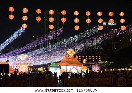 HONG KONG, CHINA - OCT 1: Citizen celebrated Moon Festival and National day of China in Victoria Park with traditional Lantern and lighting show on 1st October, 2012 in Hong Kong