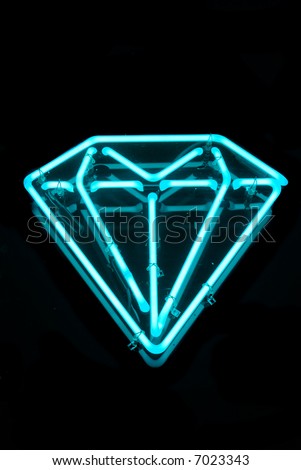 Illuminated blue diamond shaped neon sign