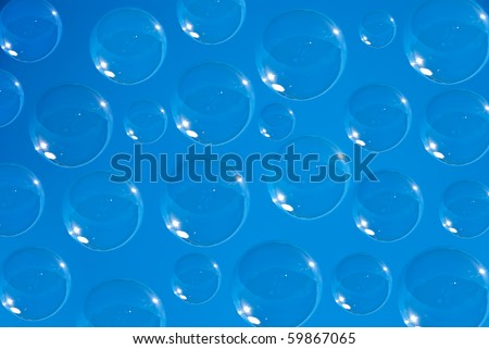soap bubbles against the blue sky