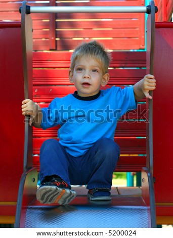 Kid on a slide (with a step forward)