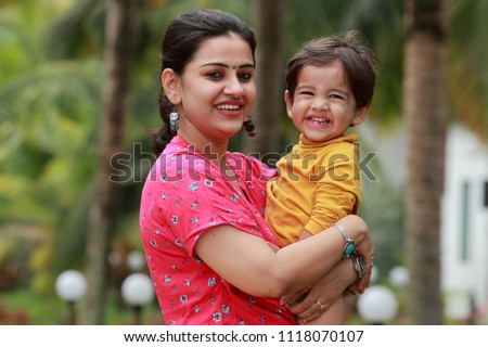 Similar – Image, Stock Photo Happy baby outdoors, toddler walks in the summer garden