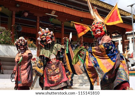 LEH, INDIA - SEPT 02 : Traditional artists perform Cham dance during Ladakh Festival on September 02, 2012 in Leh, India. Cham dance is a masked dance associated with some sects of Buddhists.