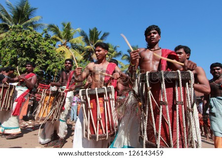 HARIPAD - JAN 27: Percussion artists play drums in the Thaipooyam festival at Subramanian temple on January 27, 2013 in Haripad, India.Thaipooyam festival is devoted to Lord Murugan in India.