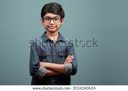 Similar – Image, Stock Photo Portrait of a 9 year old boy outdoors, with his hands aroung his eyes, like he’s using binoculars, wearing casual clothes