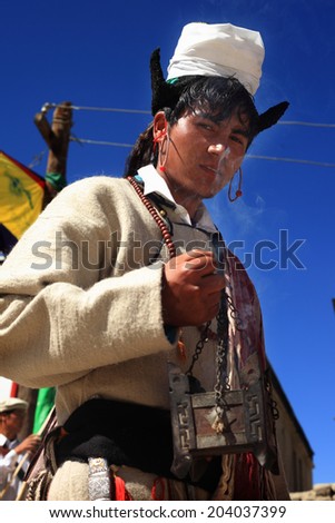 LEH, INDIA - SEPT 01 : An unidentified Ladakhi tribal man wearing traditional dress participates in the cultural procession during Ladakh Festival on September 01, 2012 in Leh, India.