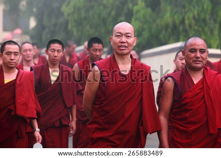 BYLAKUPPE, INDIA - MAR 29, 2015 : Unidentified Buddhist monks walk in group for morning prayer on March 29, 2015 in Bylakuppe, India. Bylakuppe is second largest Tibetan refugee settlements in India.