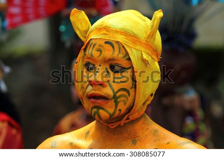 KOCHI, INDIA - AUG 19: Unidentified men with different costumes and art forms participate in a cultural procession as part of Onam celebration held on August 19, 2015 at Kochi, Kerala, India.