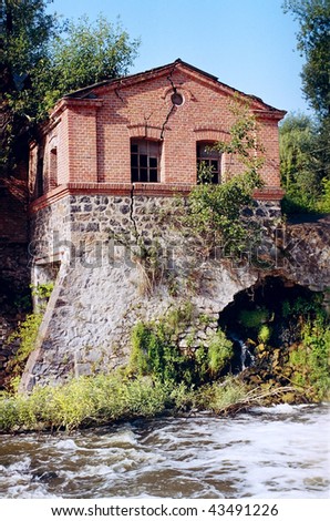 old water mill in which a crack