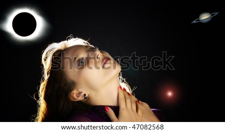 young woman against the backdrop of the starry sky